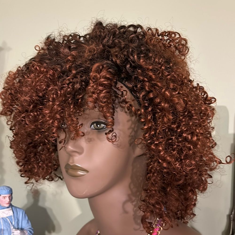 Synthetic wig curly/kinky cut.  Very full/thick.  NWT